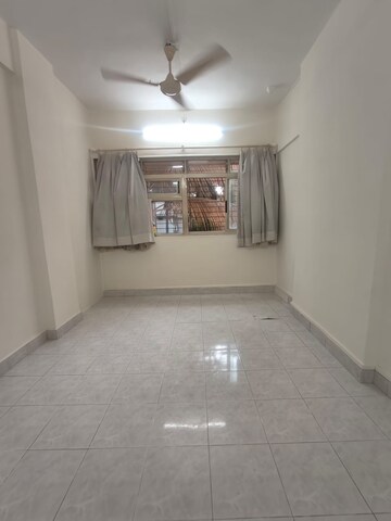 Room in 1 BHK Apartment at Dheeraj Solitaire, Malad West – for Rent