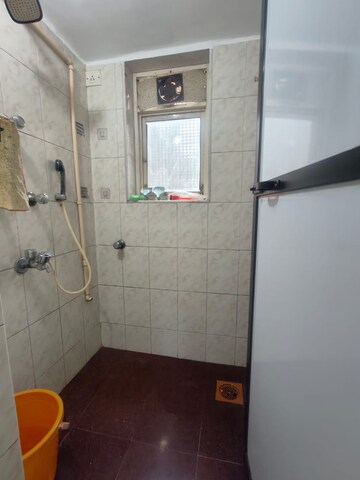 Bathroom in 1 BHK Apartment at Dheeraj Solitaire, Malad West – for Rent