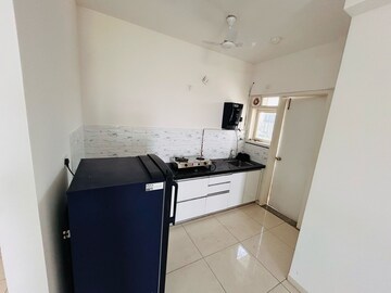 Kitchen in 2 BHK Apartment at Amanora Gold Towers, Hadapsar – for Rent