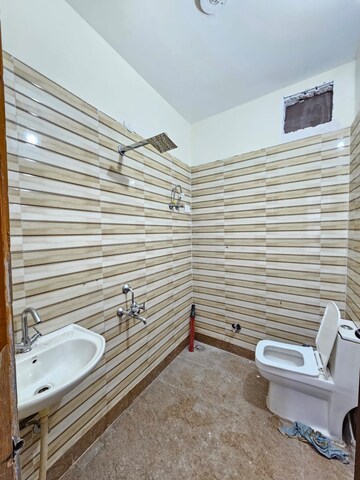 Bathroom in 2 BHK Builder Floor at Ignou Road – for Rent