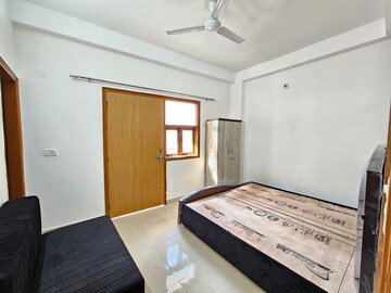 Bedroom in 2 BHK Builder Floor at Ignou Road – for Rent