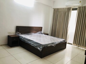 Bedroom in 3 BHK Apartment at JP Iscon Platinum, Bopal – for Rent