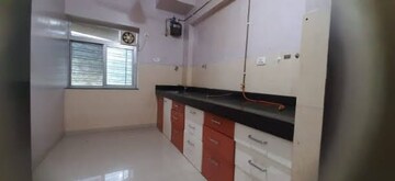 Kitchen in 2 BHK Apartment at Kalpataru Hills, Manpada – for Rent