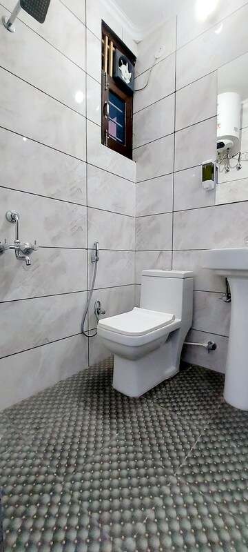 Bathroom in 2 BHK Builder Floor at Sahastradhara Road – for Rent