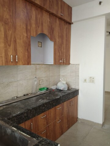 Kitchen in 2 BHK Apartment at Nirala Aspire, Sector 16 Greater Noida – for Rent