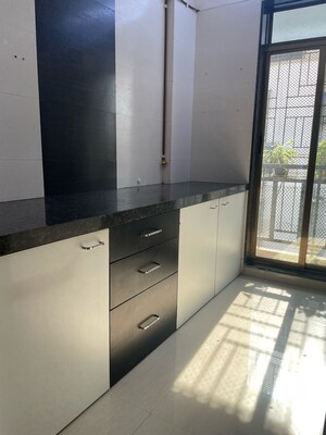 Kitchen in 1 BHK Apartment at Seawoods – for Sale