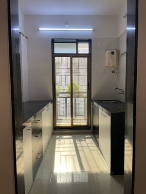 Kitchen in 1 BHK Apartment at Seawoods – for Sale