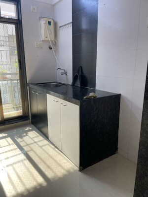 Kitchen in 1 BHK Apartment at Seawoods – for Sale