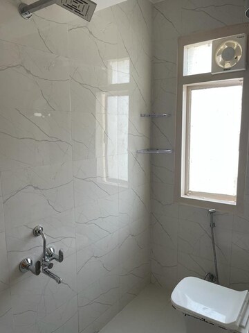 Bathroom in 1 RK Apartment at Emaar Emerald Floors Premier, Sector 65 – for Rent