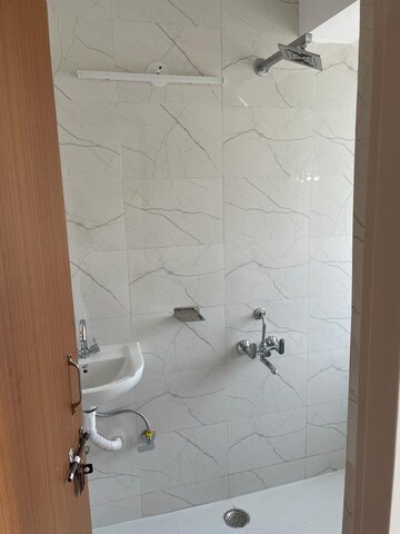 Bathroom in 1 RK Apartment at Emaar Emerald Floors Premier, Sector 65 – for Rent