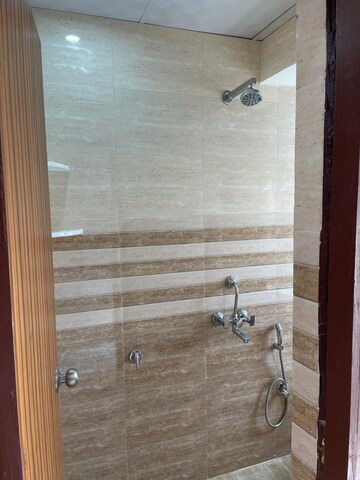 Bathroom in 1 RK Apartment at Emaar Emerald Floors Premier, Sector 65 – for Rent