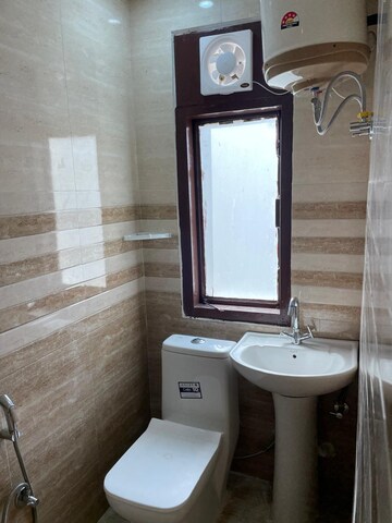 Bathroom in 1 RK Apartment at Emaar Emerald Floors Premier, Sector 65 – for Rent