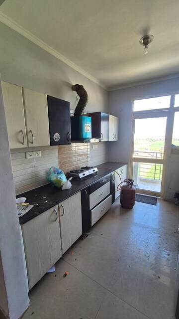 Kitchen in 2 BHK Apartment at Supreme Homes, Dhakoli Village – for Rent