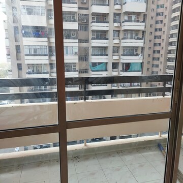 Balcony in 4 BHK Apartment at Ansal Sushant Estate, Sector 52 – for Rent