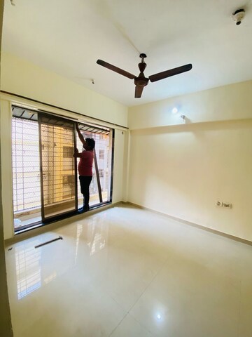 Room in 1 BHK Apartment at UK Iridium, Kandivali East – for Rent