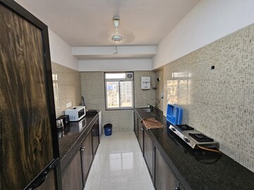 Kitchen in 2 BHK Apartment at Millionaire Heritage, Andheri West – for Rent