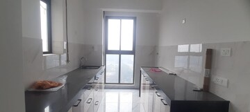 Kitchen in 2 BHK Apartment at Rustomjee Urbania Azziano, Majiwada – for Sale