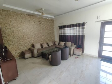 Living Room in 2 BHK Apartment at Shri Devaji Residency, Dhakoli Village – for Rent