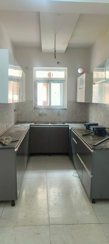 Kitchen in 3 BHK Apartment at Ansal API Victoria Floors, Dhakoli Village – for Rent
