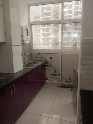 Kitchen in 2 BHK Apartment at Gulshan Bellina, Sector 16 Greater Noida – for Rent