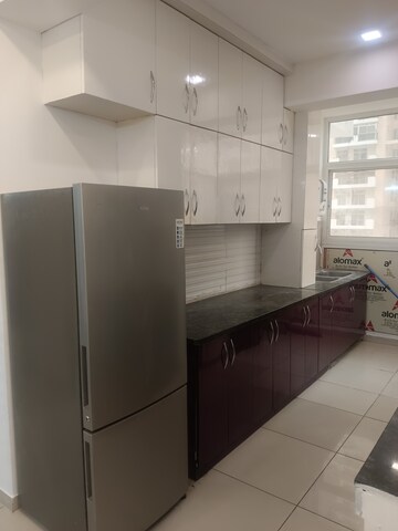 Kitchen in 2 BHK Apartment at Gulshan Bellina, Sector 16 Greater Noida – for Rent