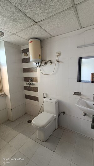 Bathroom in 3 BHK Apartment at Amrapali Eden Park, Sector 50 – for Sale