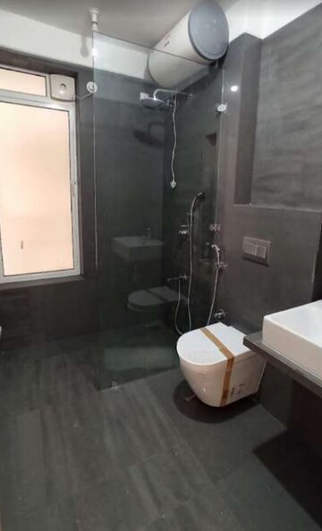 Bathroom in 2 BHK Apartment at Soham Crystal Spires, Ghodbunder Road – for Rent