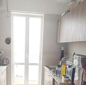 Kitchen in 2 BHK Apartment at Soham Crystal Spires, Ghodbunder Road – for Rent