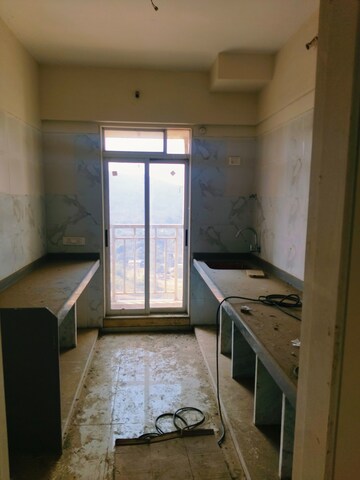 Kitchen in 1 BHK Apartment at Ram Pushpanjali Residency, Owale – for Rent