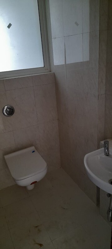 Bathroom in 1 BHK Apartment at Puranik Hometown, Ghodbunder Road – for Rent