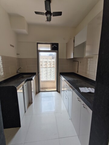 Kitchen in 2 BHK Apartment at Prithvi Pride, Mira Road – for Sale