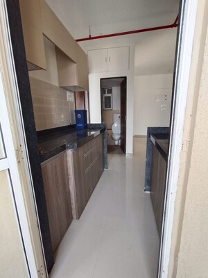 Kitchen in 1 BHK Apartment at JP North Elara, Mira Road – for Sale