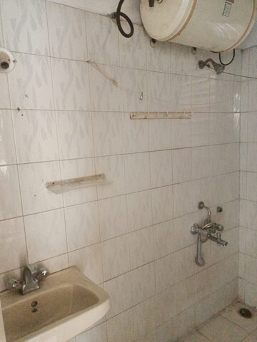 Bathroom in 2 BHK Apartment at Oxford Comforts, Wanwadi – for Rent