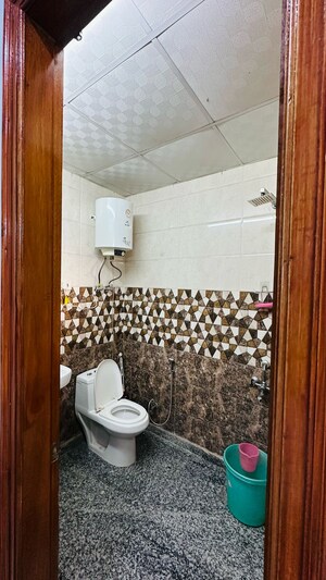 Bathroom in 2 BHK Apartment at Himalaya Tower, Ahinsa Khand 1 – for Sale