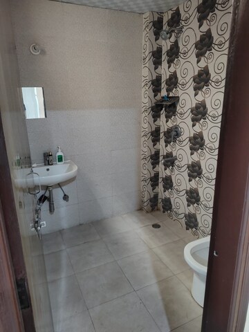 Bathroom in 3 BHK Builder Floor at Ansal API Esencia, Sector 67 – for Rent