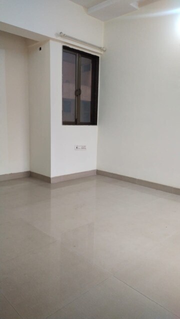 Room in 2 BHK Apartment at Madhav Shreeji Palacia, Waghbil – for Rent
