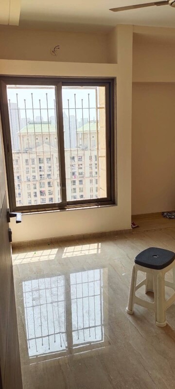 Room in 2 BHK Apartment at Madhav Shreeji Palacia, Waghbil – for Rent