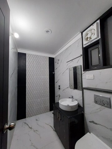 Bathroom in 3 BHK Apartment at Golden Sand Apartments, Dhakoli Village – for Sale