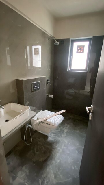 Bathroom in 2 BHK Apartment at Zindagi CHS, Khar West – for Sale