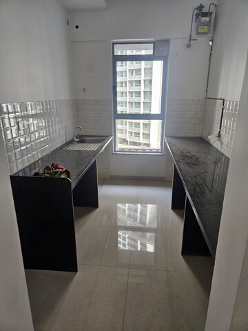Kitchen in 2 BHK Apartment at Kalpataru Immensa, Kolshet Road – for Rent