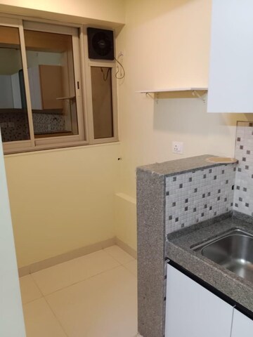 Kitchen in 3 BHK Apartment at Shapoorji Pallonji Alpine, Kandivali East – for Rent