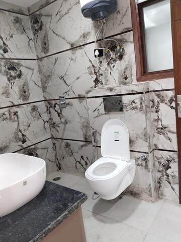 Bathroom in 3 BHK Builder Floor at Freedom Fighters Enclave – for Rent