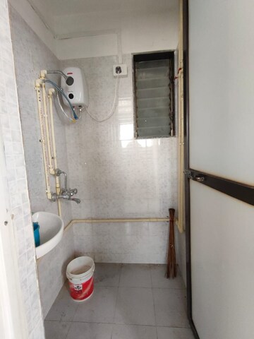 Bathroom in 1 BHK Apartment at Omkar Sai CHS, Lower Parel – for Rent