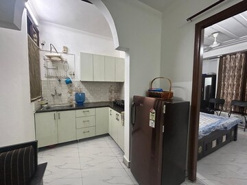 Kitchen in 2 BHK Builder Floor at Freedom Fighters Enclave – for Rent