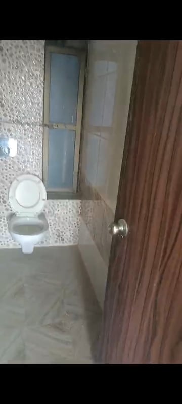 Bathroom in 2 BHK Apartment at Man Opus, Mira Road – for Rent