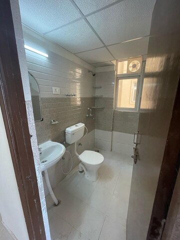 Bathroom in 2 BHK Apartment at Signature Orchard Avenue 2, Sector 93 – for Rent