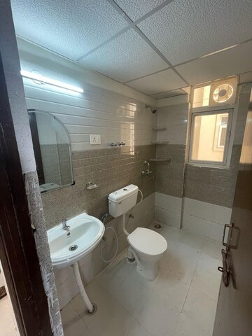 Bathroom in 2 BHK Apartment at Signature Orchard Avenue 2, Sector 93 – for Rent