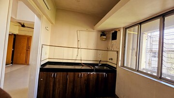 Kitchen in 1 BHK Apartment at Kalpataru Sidhachal Phase IV, Kapur Bawdi – for Rent