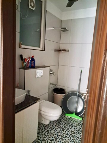 Bathroom in 3 BHK Apartment at Dhakoli Village – for Rent