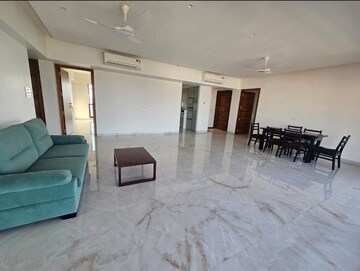 Living Room in 4 BHK Apartment at Aum Nirvan, Khar West – for Rent